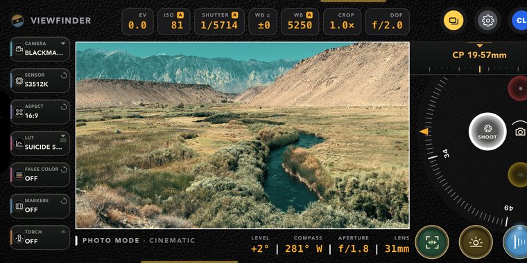 CamPlot Director’s Viewfinder framing a valley through a cinema camera body with live exposure and lens controls
